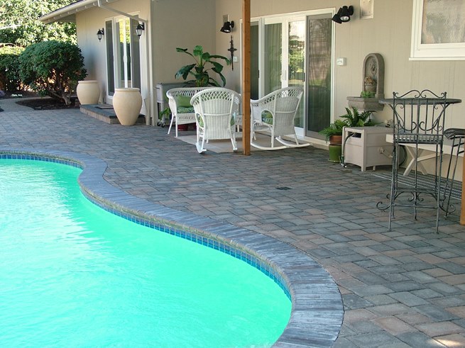 paver patio with pool design