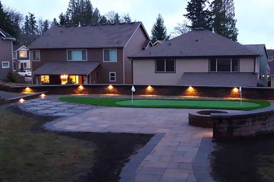 Landscape Lighting With Putting Green with Synthetic Turf installed by Sta-built Construction