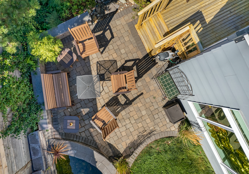 drone shot of paver patio with furniture