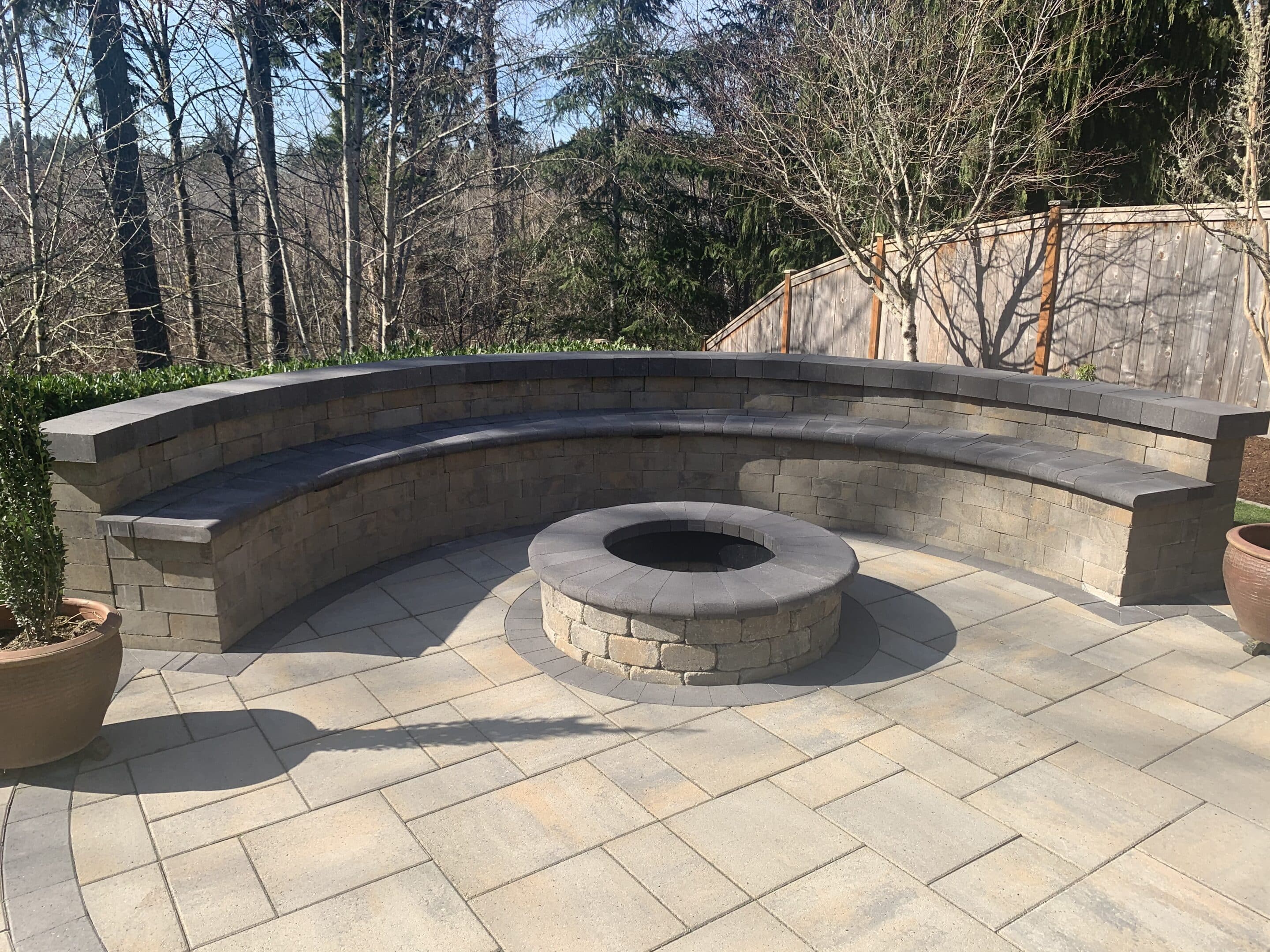 Patio fire pit with seat wall