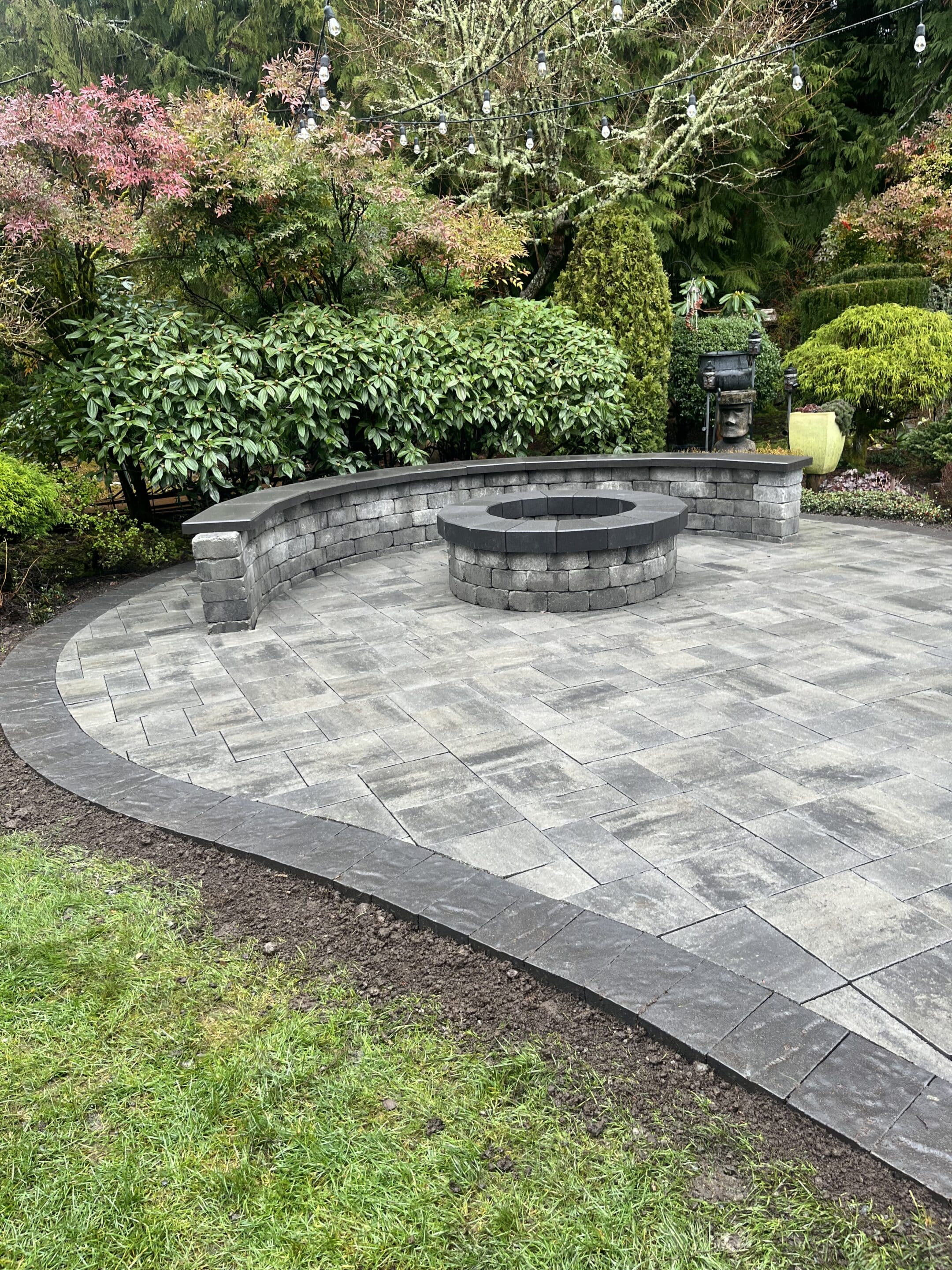 Patio fire pit with seat wall