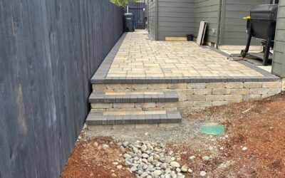 Paver Walkway Installation in Vancouver, WA: A 55-Foot Side Yard Run and a Raised Terrace on a 64-Foot Grade Wall