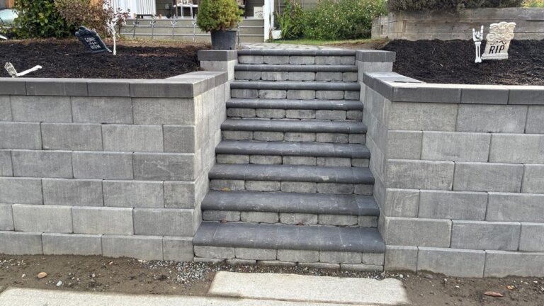 Retaining Wall Installation in Tacoma, WA: A 71-Foot Front Yard Wall With a Rebuilt Stair and a Curved Paver Walk