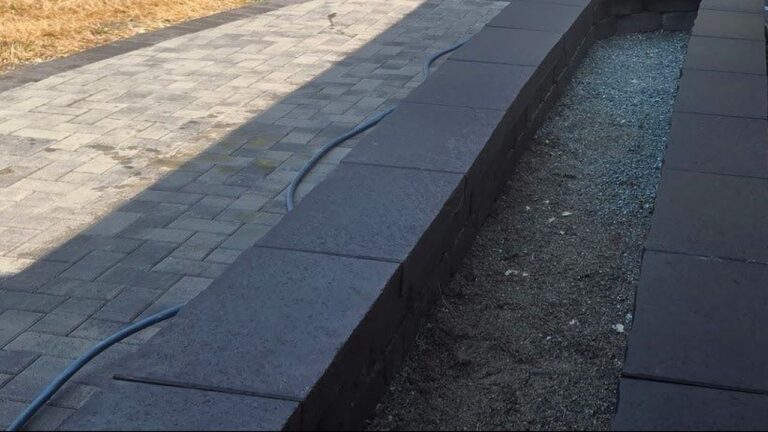 Curved Paver Walkway and Garden Wall in Redmond, WA: 53 Feet of Belgard Holland From the Driveway to the Porch, With a Planter Set Off the Siding